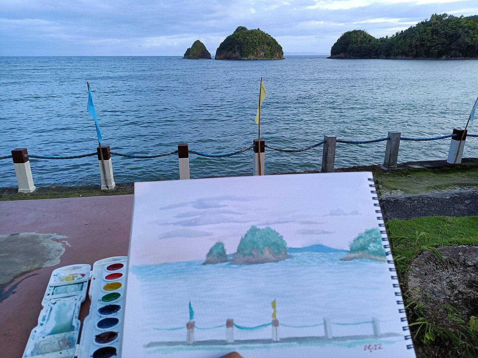 Küstenblick und Zeichnung am Twin Rock Beach Resort